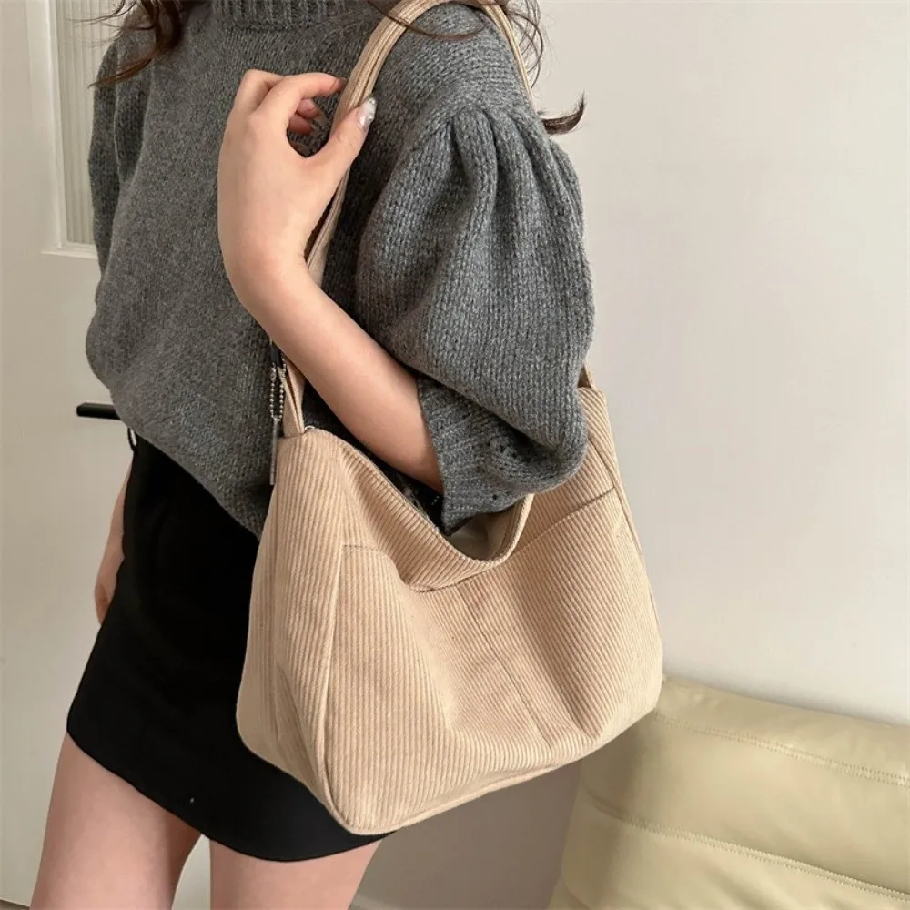 Solid Color Corduroy Shoulder Bag Large Capacity Korean Style Crossbody Bag Handheld with Pendant Women Tote Bag Women
Solid Color Corduroy Shoulder Bag Large Capacity Korean Style Crossbody Bag Handheld with Pendant Women Tote Bag Women