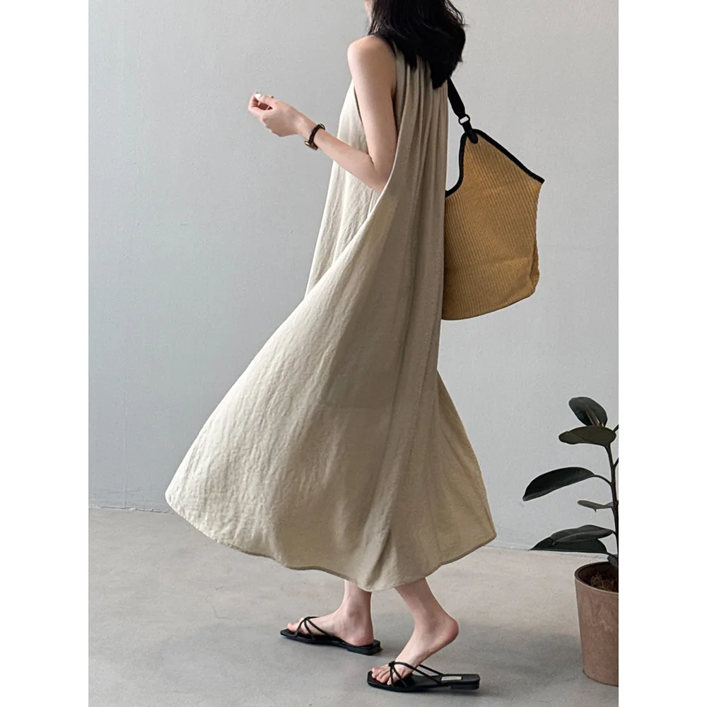 Loose fitting sleeveless dress 2025 summer new French slimming mid length vest dress
Loose fitting sleeveless dress 2025 summer new French slimming mid length vest dress