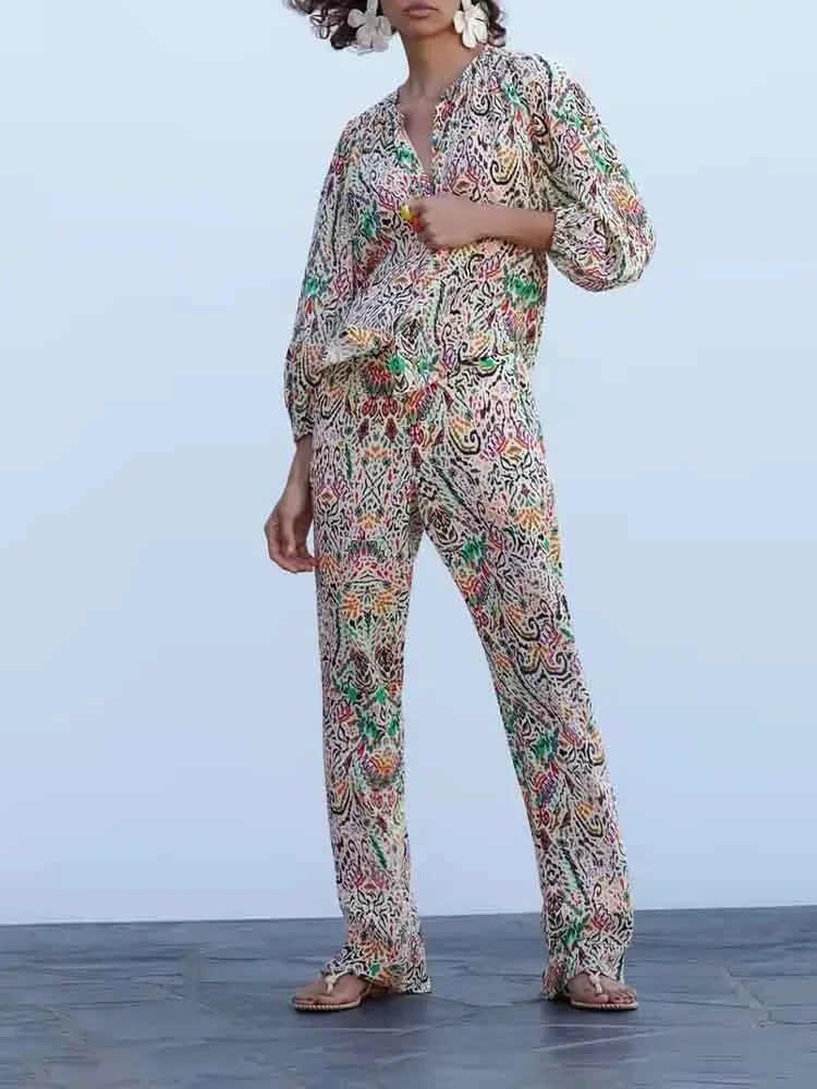European style new women's fashion versatile temperament loose round neck printed shirt flared trousers suit
European style new women's fashion versatile temperament loose round neck printed shirt flared trousers suit