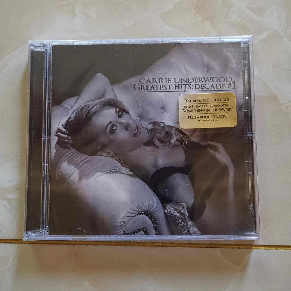 Carrie Underwood Greatest Hits Decade 1 CD 2014 2 Disc Set Country Pop Album Something in the Water Before He Cheats New Sealed
Carrie Underwood Greatest Hits Decade 1 CD 2014 2 Disc Set Country Pop Album Something in the Water Before He Cheats New Sealed