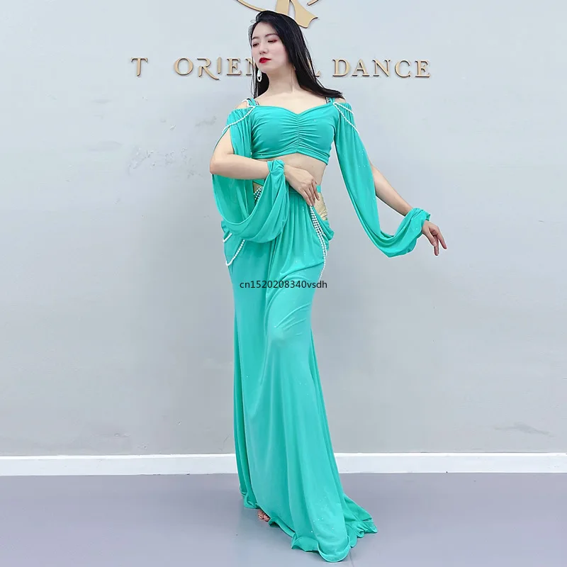 Belly Dance Clothing for Women Mesh Pearls Sleeves Top+long Skirt 2pcs Girl's Female Practice Wear Outfit Oriental Costumes Set
Belly Dance Clothing for Women Mesh Pearls Sleeves Top+long Skirt 2pcs Girl's Female Practice Wear Outfit Oriental Costumes Set