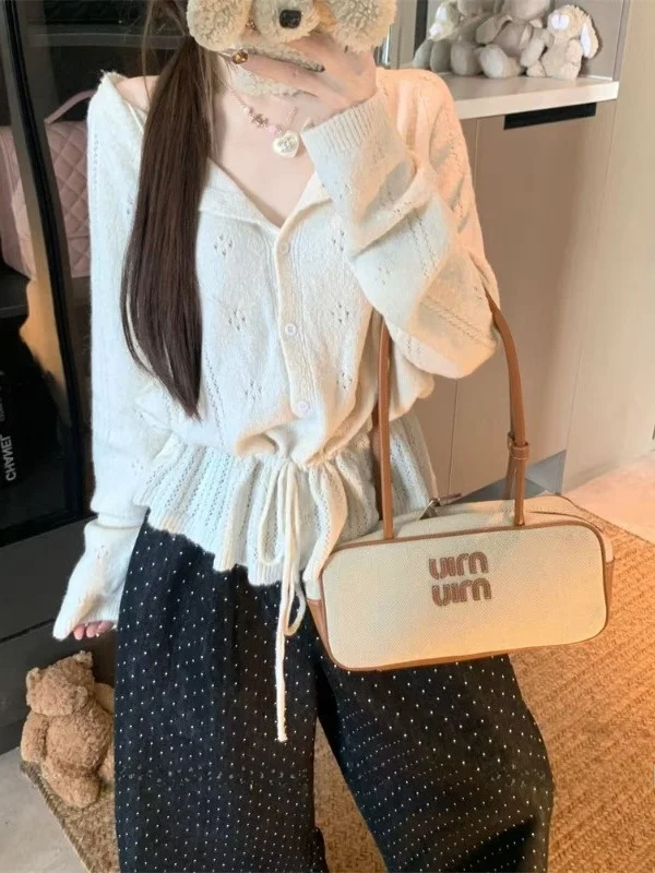 Осенний дизайнерский вязаный кардиган с поясом на талии и вырезами, женский, нежный, свободный топ
Осенний дизайнерский вязаный кардиган с поясом на талии и вырезами, женский, нежный, свободный топ