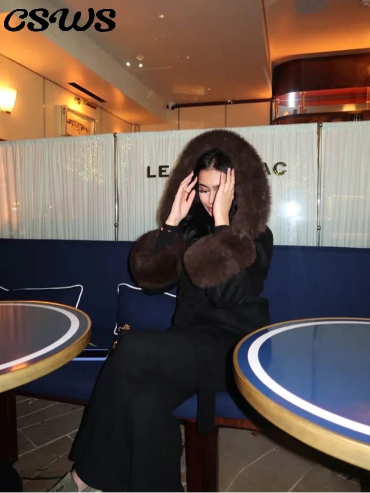 Элегантное меховое лоскутное пальто с капюшоном, женское шерстяное свободное пальто с длинными рукавами и лацканами, 2026, весенний пояс, свободная верхняя одежда для женщин
Элегантное меховое лоскутное пальто с капюшоном, женское шерстяное свободное пальто с длинными рукавами и лацканами, 2026, весенний пояс, свободная верхняя одежда для женщин