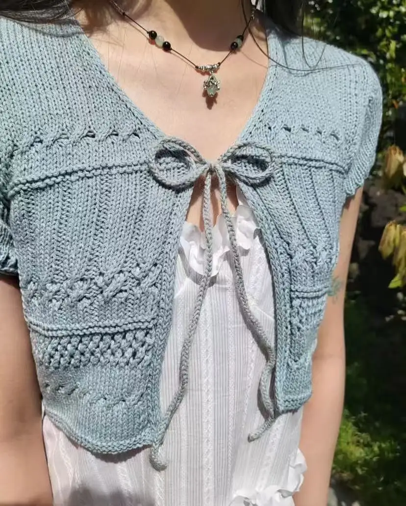 Summer shawl lace up thin sunscreen knitted cardigan top, new short sleeved hollowed out cover, versatile and fashionable
Summer shawl lace up thin sunscreen knitted cardigan top, new short sleeved hollowed out cover, versatile and fashionable