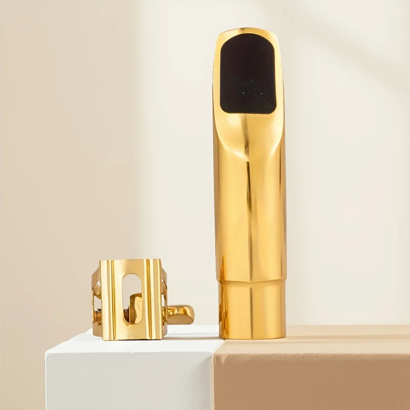 Мундштук для альт-саксофона из латуни, поставляется с лигатурой и колпачком, металлическая джазовая музыка, альт-саксофон.
Мундштук для альт-саксофона из латуни, поставляется с лигатурой и колпачком, металлическая джазовая музыка, альт-саксофон.