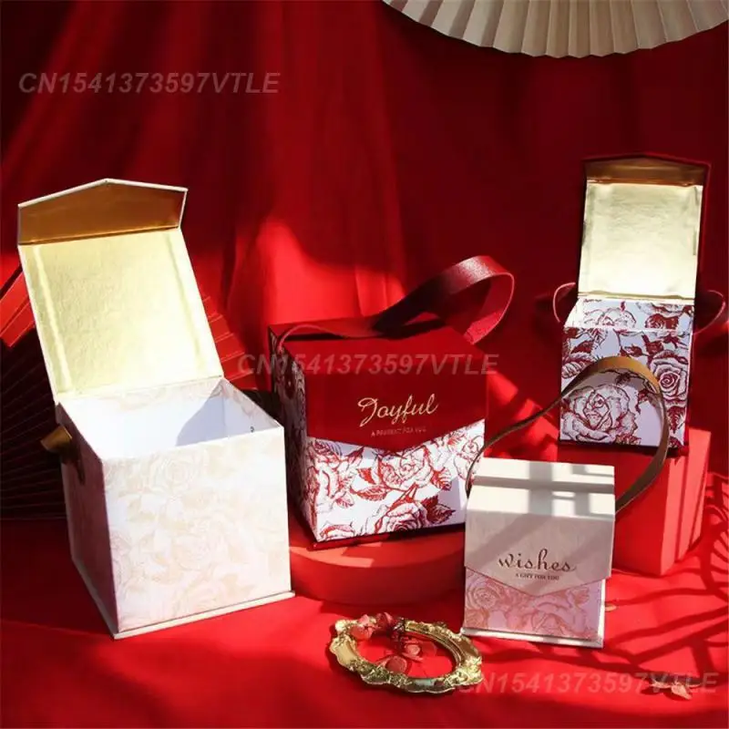 Handheld Gift Box Easy To Fold Not Easy To Fall Off Charming Complicated Gift Packaging Red Velvet Gift Box Bright Colors
Handheld Gift Box Easy To Fold Not Easy To Fall Off Charming Complicated Gift Packaging Red Velvet Gift Box Bright Colors