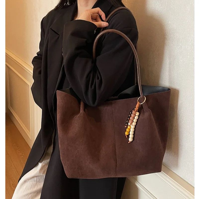 Women's Suede Tote Shoulder Bag with Bead Accessory & Top Handle for Daily Office Streetwear, Weekend Travel, Shopping & Errands
Women's Suede Tote Shoulder Bag with Bead Accessory & Top Handle for Daily Office Streetwear, Weekend Travel, Shopping & Errands