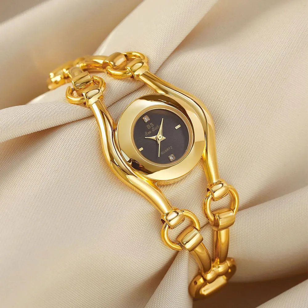 Роскошные золотые женские кварцевые часы 2025, элегантный винтажный дизайн, женские платья, наручные часы, модные классические часы, стильный подарок
Роскошные золотые женские кварцевые часы 2025, элегантный винтажный дизайн, женские платья, наручные часы, модные классические часы, стильный подарок