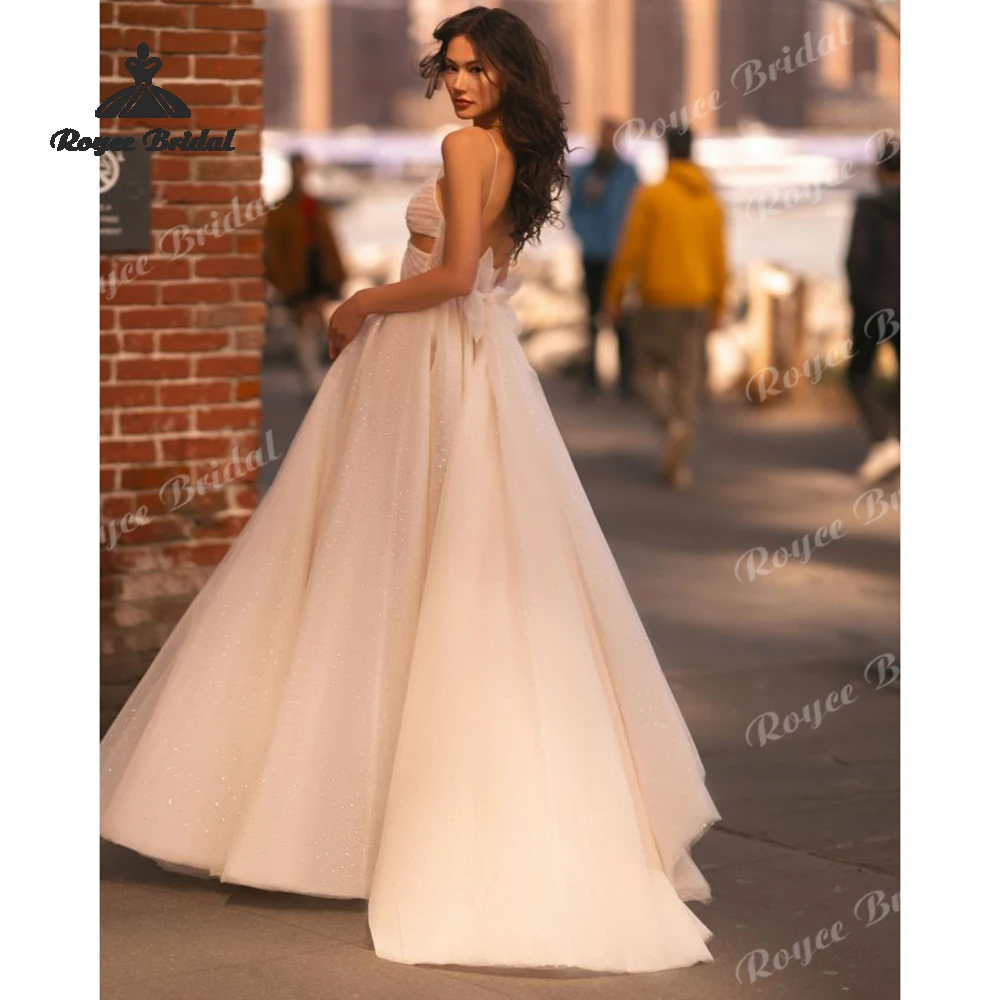 Shiny Cut Out A Line Wedding Dresses 2026 V Neck Bow Sheer Tulle Plus Size Beach Bridal Gown Customized vestido de novia
Shiny Cut Out A Line Wedding Dresses 2026 V Neck Bow Sheer Tulle Plus Size Beach Bridal Gown Customized vestido de novia