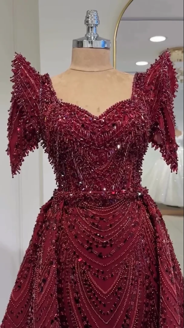 FATAPAESE Customized Sparking Stone Gems Tassels Sweetheart Neck Deep V-cut Removable Cape Tail on the Gown Straight Fitte
FATAPAESE Customized Sparking Stone Gems Tassels Sweetheart Neck Deep V-cut Removable Cape Tail on the Gown Straight Fitte