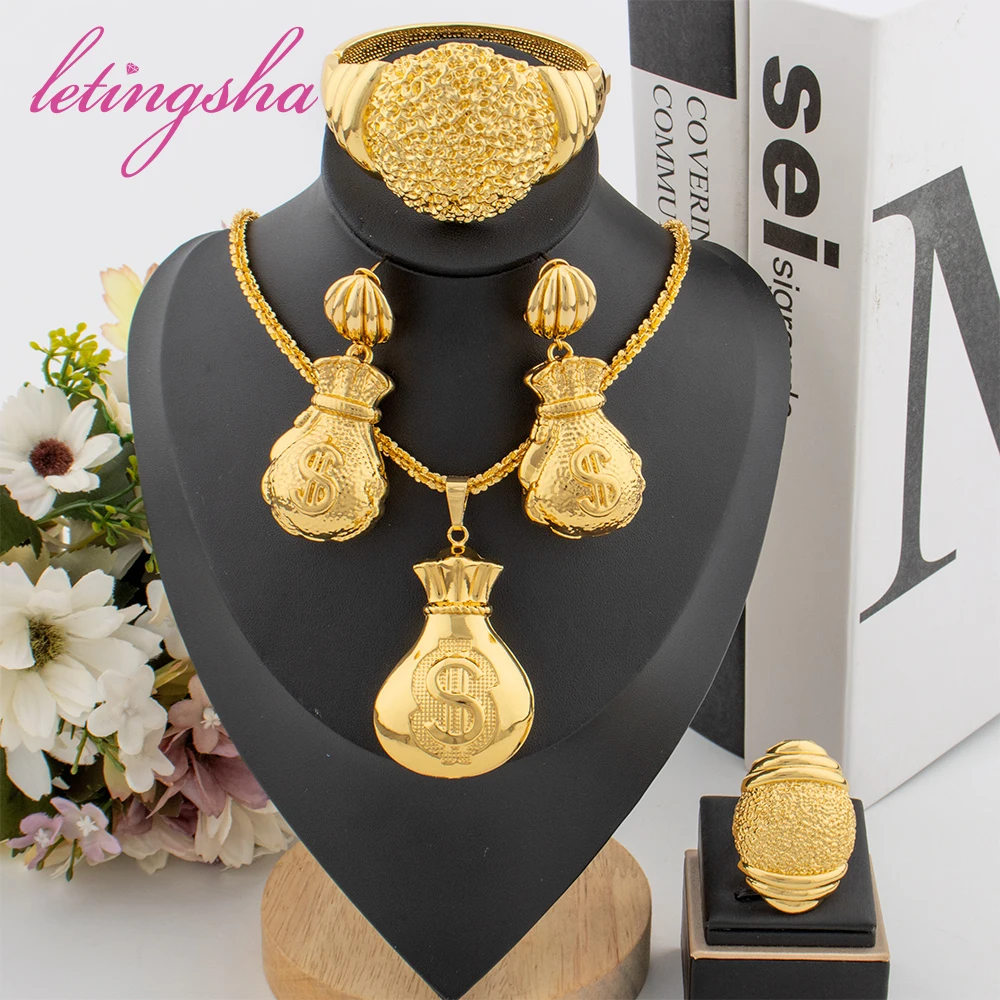 Fashion Luxury Lucky Bag Design Drop Earrings Pendant Set Gold Plated Bangle Rings Classic Gold Color Jewelry Set Party Gifts
Fashion Luxury Lucky Bag Design Drop Earrings Pendant Set Gold Plated Bangle Rings Classic Gold Color Jewelry Set Party Gifts
