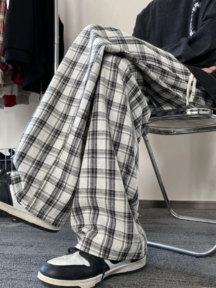 Мужские весенне-осенние брюки в клетку свободного кроя с широкими штанинами, прямые спортивные брюки, повседневные модные немнущиеся молодежные брюки для активного отдыха
Мужские весенне-осенние брюки в клетку свободного кроя с широкими штанинами, прямые спортивные брюки, повседневные модные немнущиеся молодежные брюки для активного отдыха