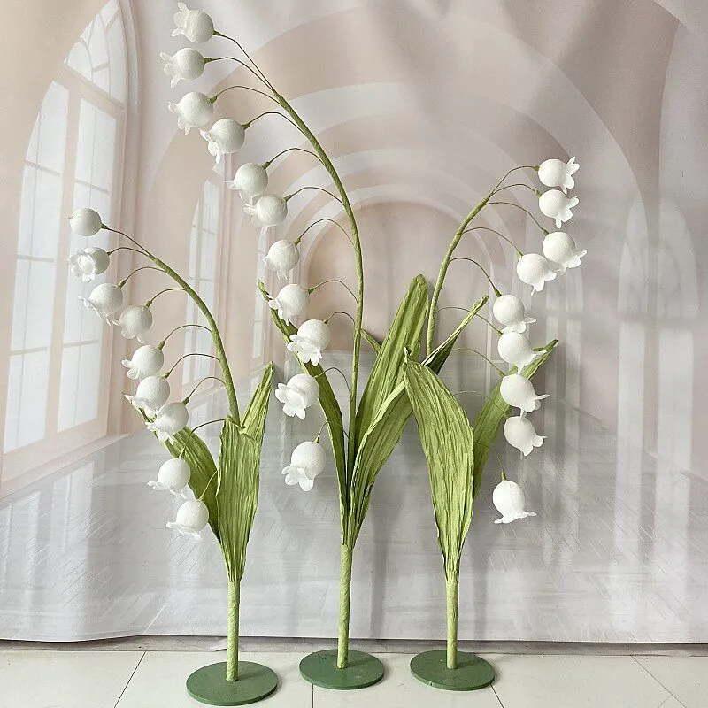 Lily of the valley wedding stage decoration flower handmade flower large art installation wedding props road wind chimes flower
Lily of the valley wedding stage decoration flower handmade flower large art installation wedding props road wind chimes flower