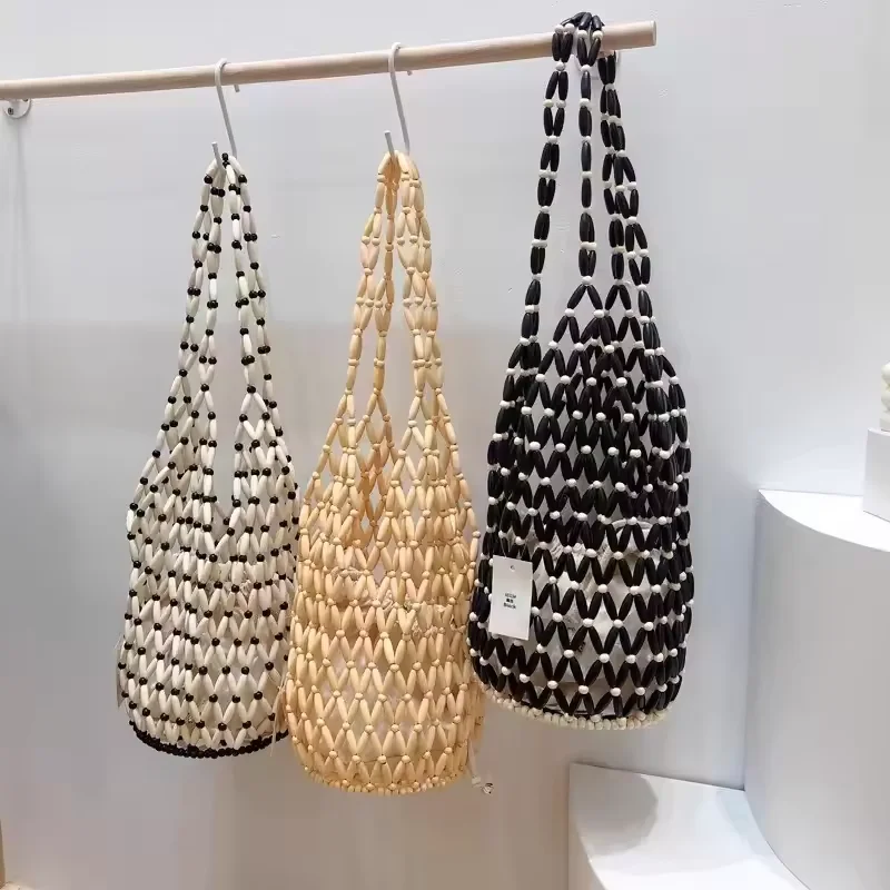 Wooden Bead Hollow-out Tote Bag for Women Bucket Shoulder Bag Handmade Beaded Woven Hand Bag Female Summer Beach Casual Handbag
Wooden Bead Hollow-out Tote Bag for Women Bucket Shoulder Bag Handmade Beaded Woven Hand Bag Female Summer Beach Casual Handbag