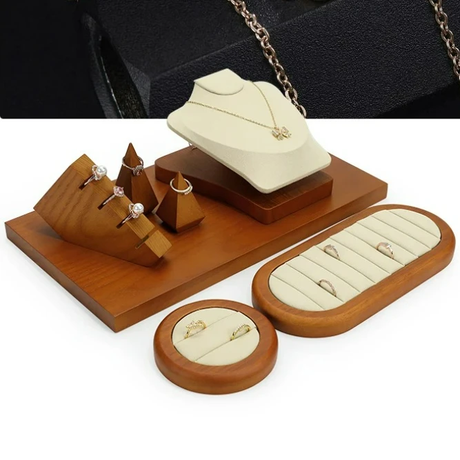 White microfiber solid wood jewelry display props, necklace display rack, jade bracelet jewelry display platform
White microfiber solid wood jewelry display props, necklace display rack, jade bracelet jewelry display platform