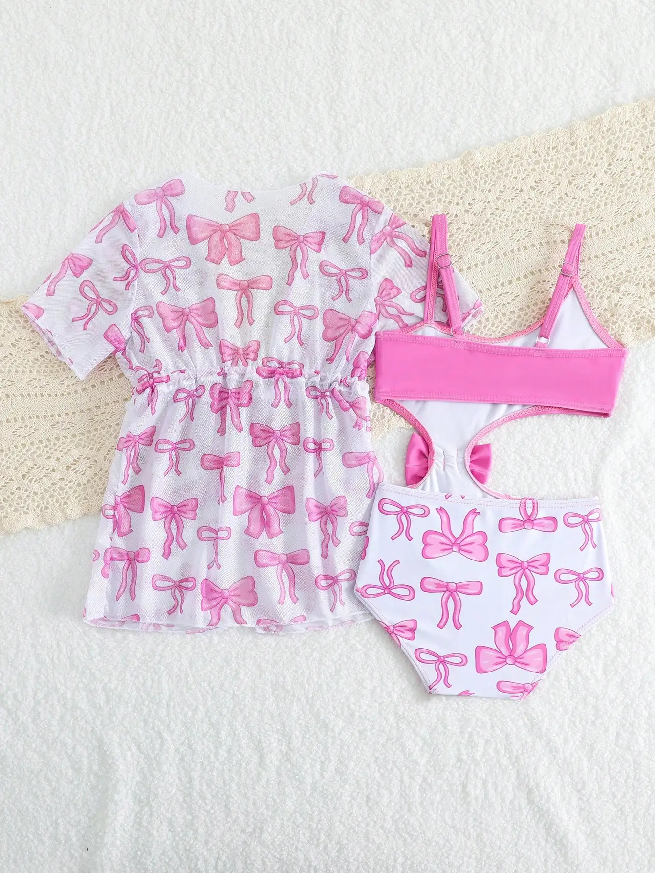 2-Piece Women Swimwear Set With Bow Print And Sunscreen Cover Up
2-Piece Women Swimwear Set With Bow Print And Sunscreen Cover Up