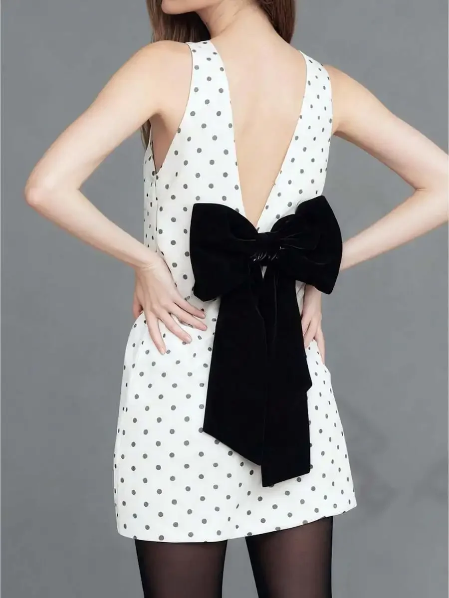 Womens Polka Dot Sleeveless Mini Dress With Large Velvet Bow Back
Womens Polka Dot Sleeveless Mini Dress With Large Velvet Bow Back