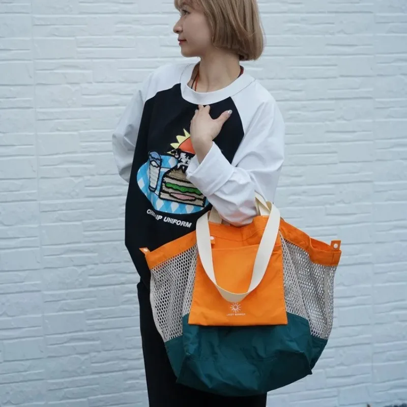 New summer trendy cool mesh pocket shoulder bag men's and women's beach bag foldable
New summer trendy cool mesh pocket shoulder bag men's and women's beach bag foldable