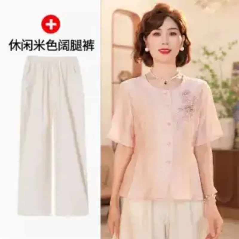 Women Summer 2 Piece Outfit Elegant Short Sleeve Blouse Wide Leg Pants Mom Clothing Set
Women Summer 2 Piece Outfit Elegant Short Sleeve Blouse Wide Leg Pants Mom Clothing Set
