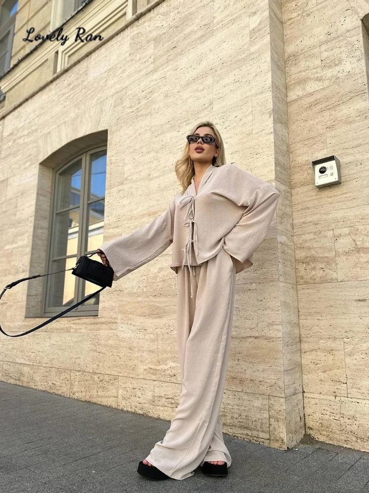 2024 Early Autumn Loose Lace Up Shirt Trousers Set Women Solid V Neck Hollow Out Cardigan Wide Leg Pants Street Lady Outfits
2024 Early Autumn Loose Lace Up Shirt Trousers Set Women Solid V Neck Hollow Out Cardigan Wide Leg Pants Street Lady Outfits