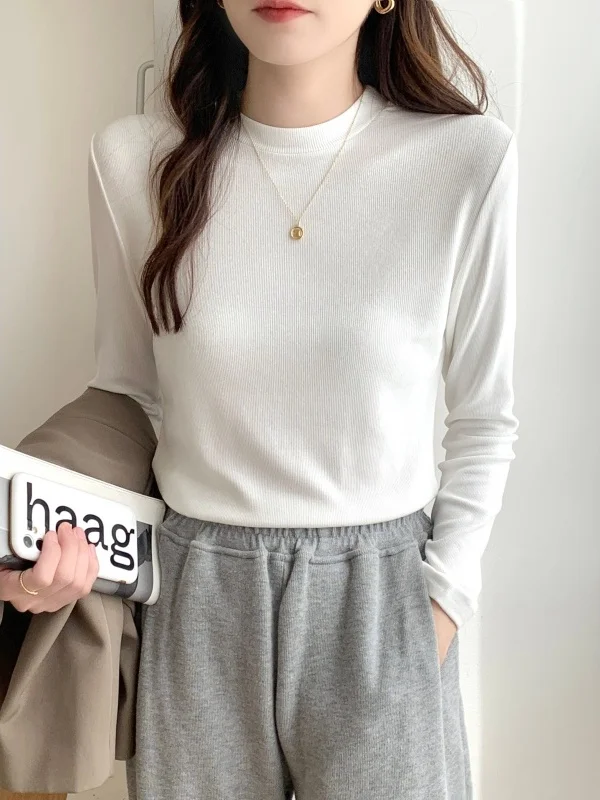 Женская зимняя базовая футболка с длинным рукавом и высоким воротником, новинка 2025 года, белая, креативный дизайн, для ношения под костюм.
Женская зимняя базовая футболка с длинным рукавом и высоким воротником, новинка 2025 года, белая, креативный дизайн, для ношения под костюм.