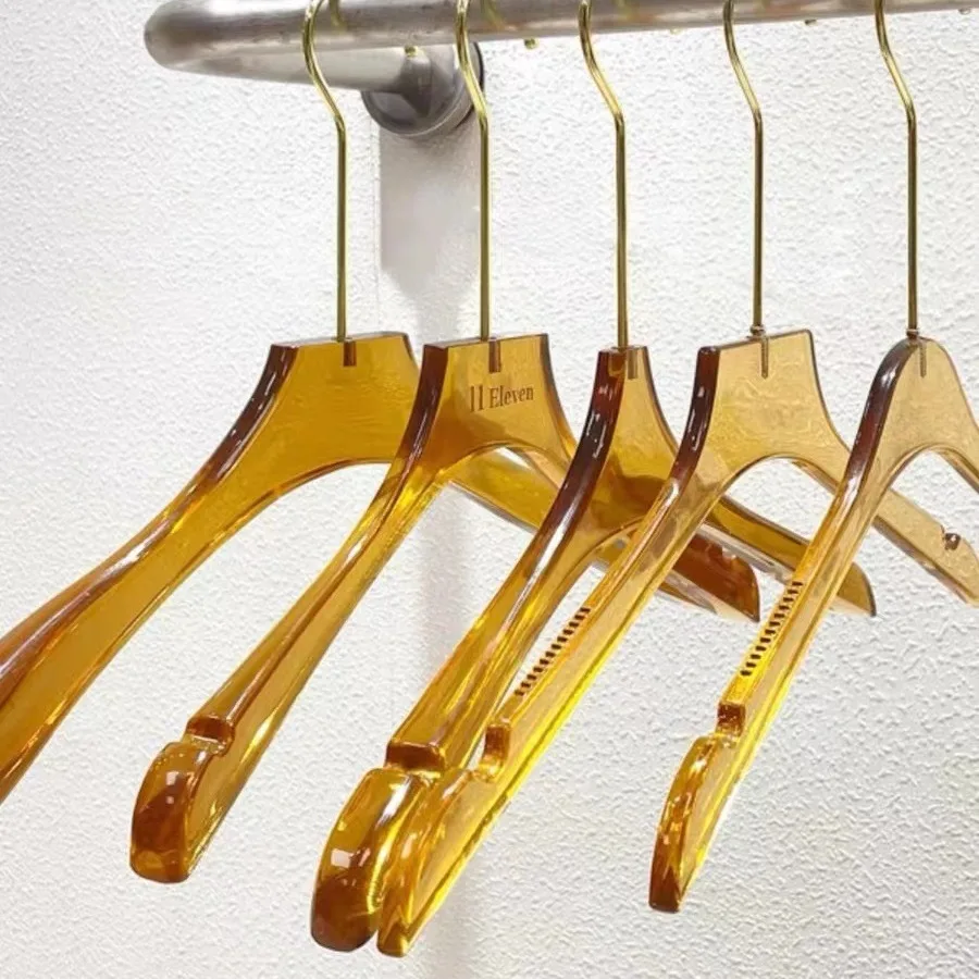 Brown transparent plastic hanger clothing store special acrylic non-slip clothes hanging support pants clip hangers for clothes
Brown transparent plastic hanger clothing store special acrylic non-slip clothes hanging support pants clip hangers for clothes