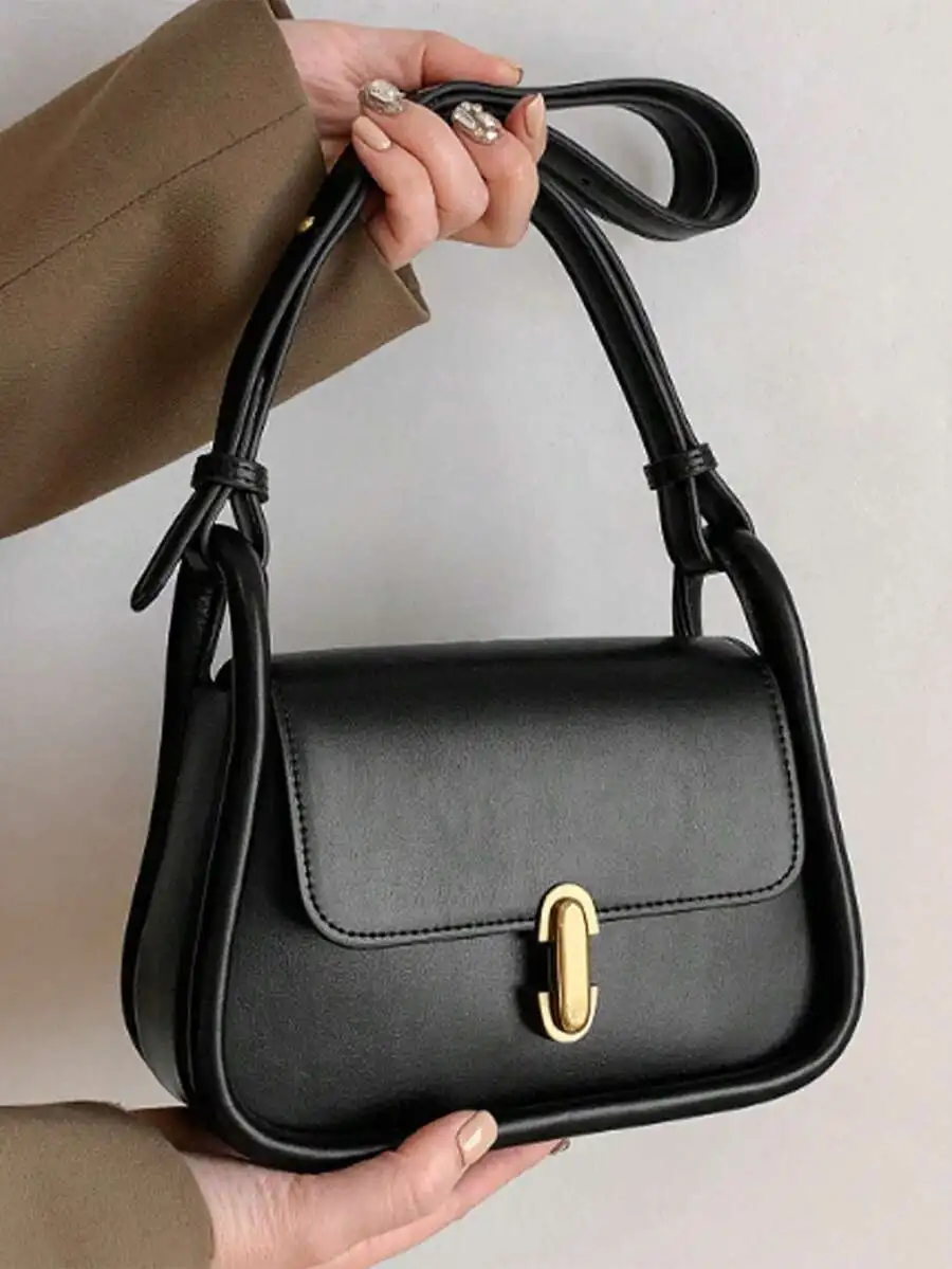 Elegant Black PU Leather Shoulder Bag With Structured Piping And Metal Clasp For Women
Elegant Black PU Leather Shoulder Bag With Structured Piping And Metal Clasp For Women