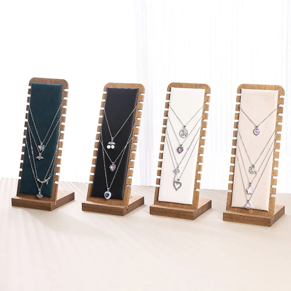 Новая деревянная подставка для украшений, разборная, с кожаной отделкой, квадратная, флокированная, деревянная подставка для хранения ювелирных изделий
Новая деревянная подставка для украшений, разборная, с кожаной отделкой, квадратная, флокированная, деревянная подставка для хранения ювелирных изделий