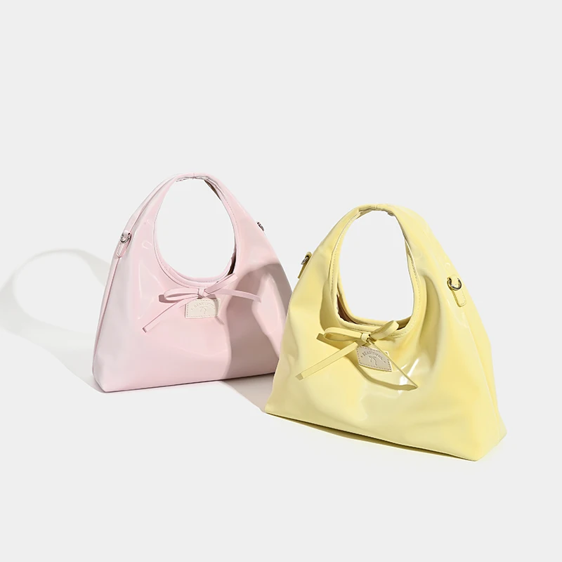 Wen Wan Sweet Strap Bow Handbag 2025 Spring New Korean Simple Casual Large Capacity Dumpling Bag
Wen Wan Sweet Strap Bow Handbag 2025 Spring New Korean Simple Casual Large Capacity Dumpling Bag