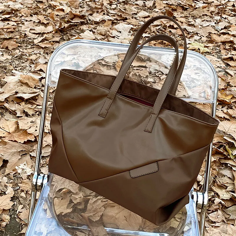 New PU Leather Shoulder Bag For Women Simple Commute Large Capacity Tote Pack Trend Casual Ladies Handbags
New PU Leather Shoulder Bag For Women Simple Commute Large Capacity Tote Pack Trend Casual Ladies Handbags