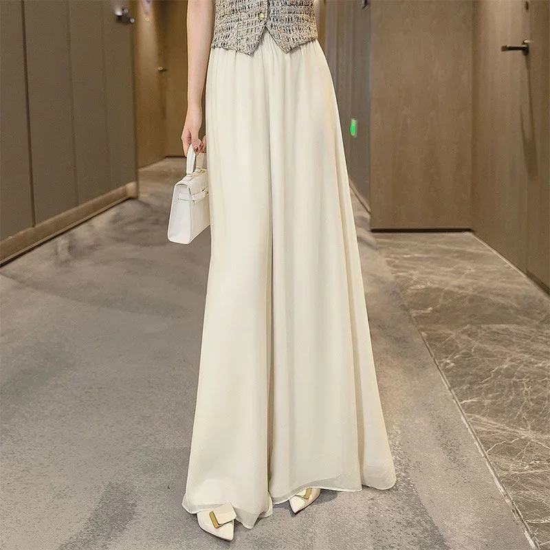 New Fashion Chiffon Wide Legs Skirt Pants Women Summer Casual Loose Thin Elastic High Waist Solid Color Flowy Long Trousers
New Fashion Chiffon Wide Legs Skirt Pants Women Summer Casual Loose Thin Elastic High Waist Solid Color Flowy Long Trousers