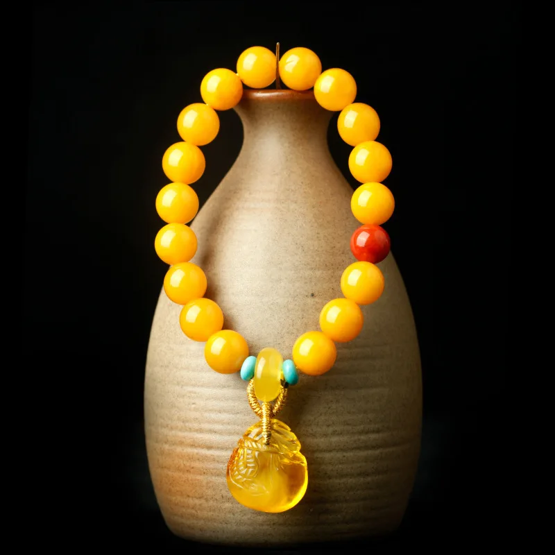 9mm Chicken Fat Old Bracelet with Red Yellow Pendant Amber
9mm Chicken Fat Old Bracelet with Red Yellow Pendant Amber