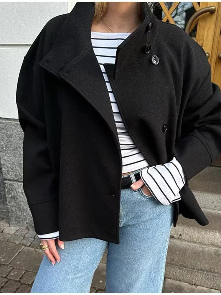 Новое женское модное универсальное темпераментное простое короткое свободное шерстяное пальто в европейском стиле с воротником-стойкой
Новое женское модное универсальное темпераментное простое короткое свободное шерстяное пальто в европейском стиле с воротником-стойкой