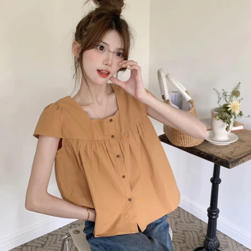 Cute Korean Solid Color Button Simplicity Shirt Tops Summer Short Sleeve Sweet Loose Youth Blouse Fashion Casual Women Clothing
Cute Korean Solid Color Button Simplicity Shirt Tops Summer Short Sleeve Sweet Loose Youth Blouse Fashion Casual Women Clothing
