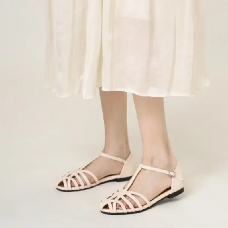 Ретро тканые полые сандалии Baotou на плоской подошве, лето 2024, новые дышащие и удобные сандалии с пряжкой для женщин
Ретро тканые полые сандалии Baotou на плоской подошве, лето 2024, новые дышащие и удобные сандалии с пряжкой для женщин