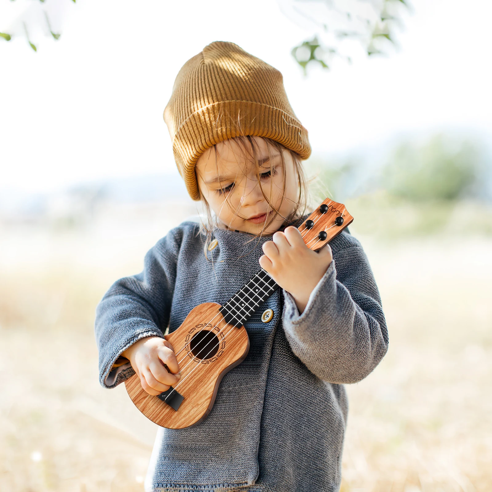 Children Little Guitar Toddler Ukulele Toy Kids Beginners Small Music Instrument 38cm Light Brown Four Strings Musical Talent
Children Little Guitar Toddler Ukulele Toy Kids Beginners Small Music Instrument 38cm Light Brown Four Strings Musical Talent