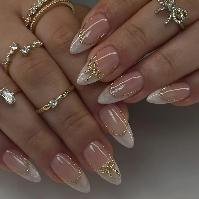24pcs French Fake Nails Finished Almond Nails Sets with Golden Bow Design False Nail Art Simple Datachable Press on Nails Tips
24pcs French Fake Nails Finished Almond Nails Sets with Golden Bow Design False Nail Art Simple Datachable Press on Nails Tips