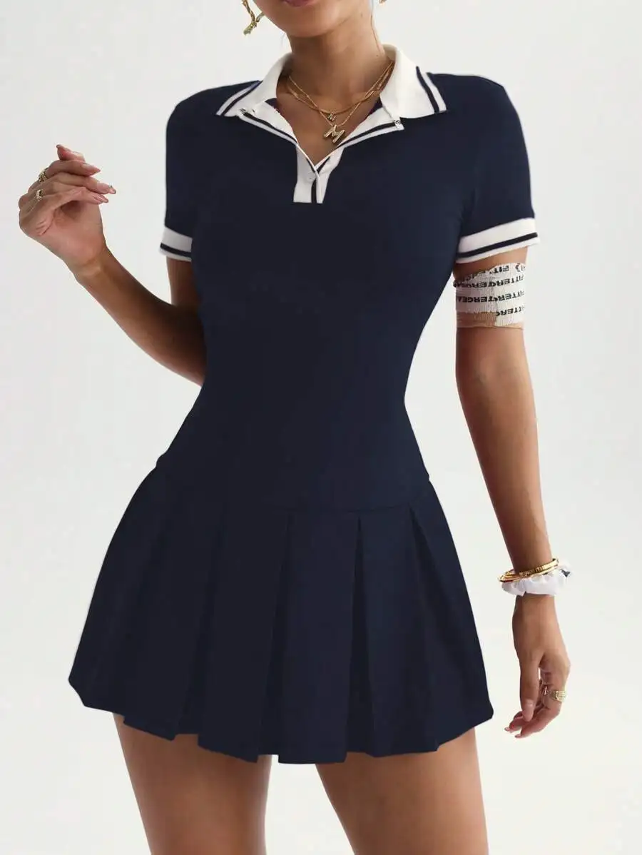 Blue Tennis Dress With Pleated Skirt And Collar
Blue Tennis Dress With Pleated Skirt And Collar