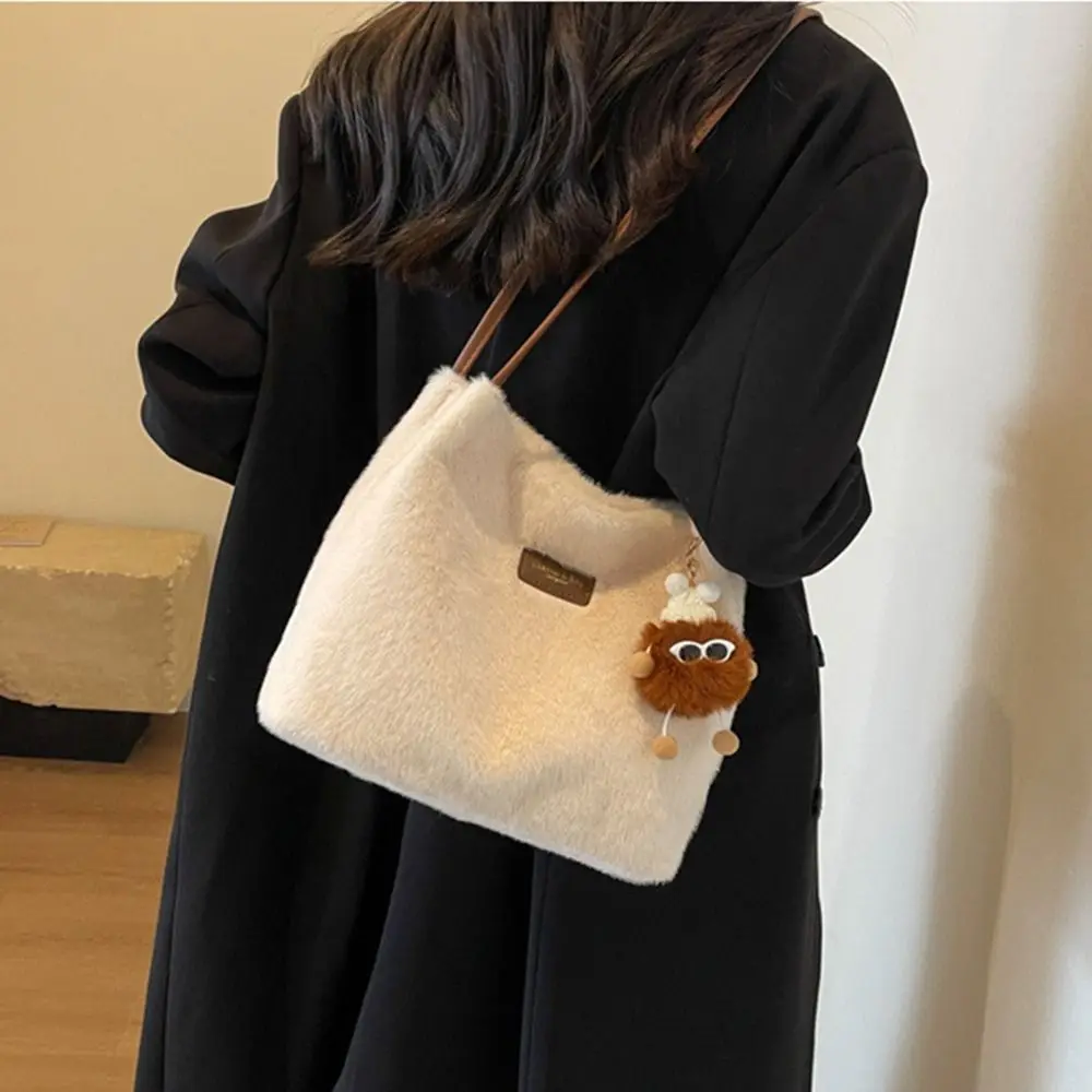 Soft Plush Large Capacity Plush Tote Portable Buckle Closure Women's Handbag Comfortable with Pendent Furry Shoulder Bag
Soft Plush Large Capacity Plush Tote Portable Buckle Closure Women's Handbag Comfortable with Pendent Furry Shoulder Bag