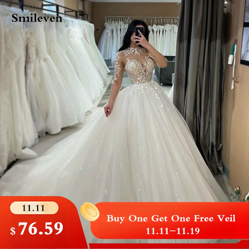 Женское кружевное свадебное платье Smileven, ТРАПЕЦИЕВИДНОЕ платье из тюля с длинными рукавами, высоким воротом и блестящей аппликацией, 2024
Женское кружевное свадебное платье Smileven, ТРАПЕЦИЕВИДНОЕ платье из тюля с длинными рукавами, высоким воротом и блестящей аппликацией, 2024