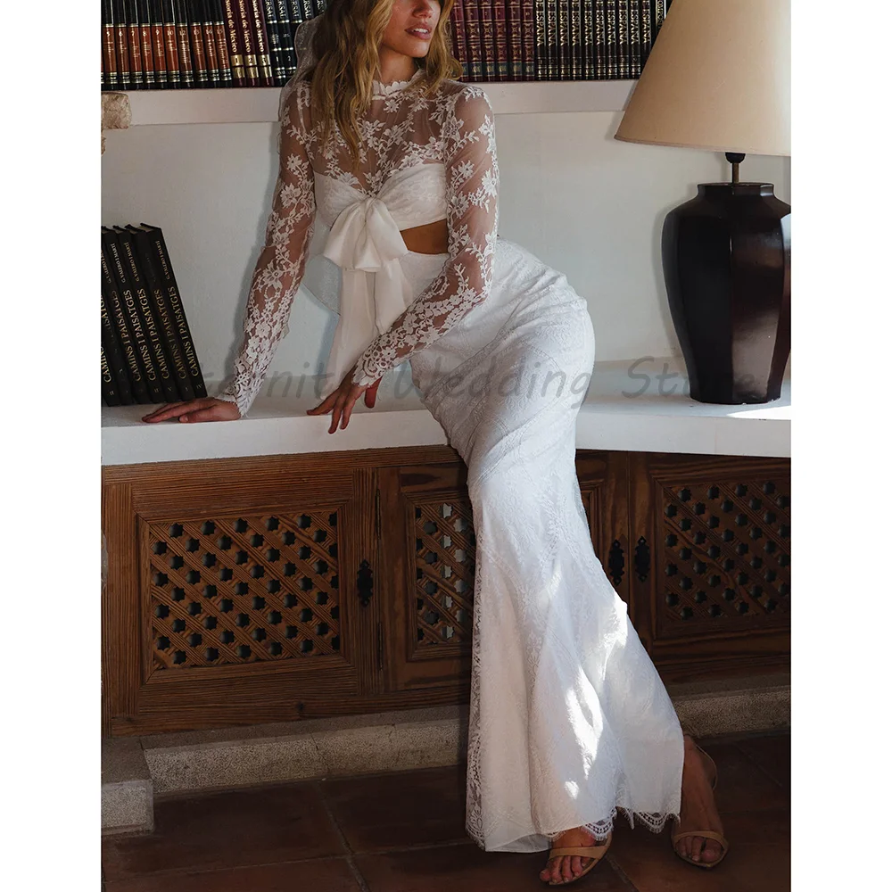 Boho Two Piece White Lace Bridal Gown High Neck Sheer Long Sleeve Crop Top Waist Bow Mermaid Wedding Dress
Boho Two Piece White Lace Bridal Gown High Neck Sheer Long Sleeve Crop Top Waist Bow Mermaid Wedding Dress