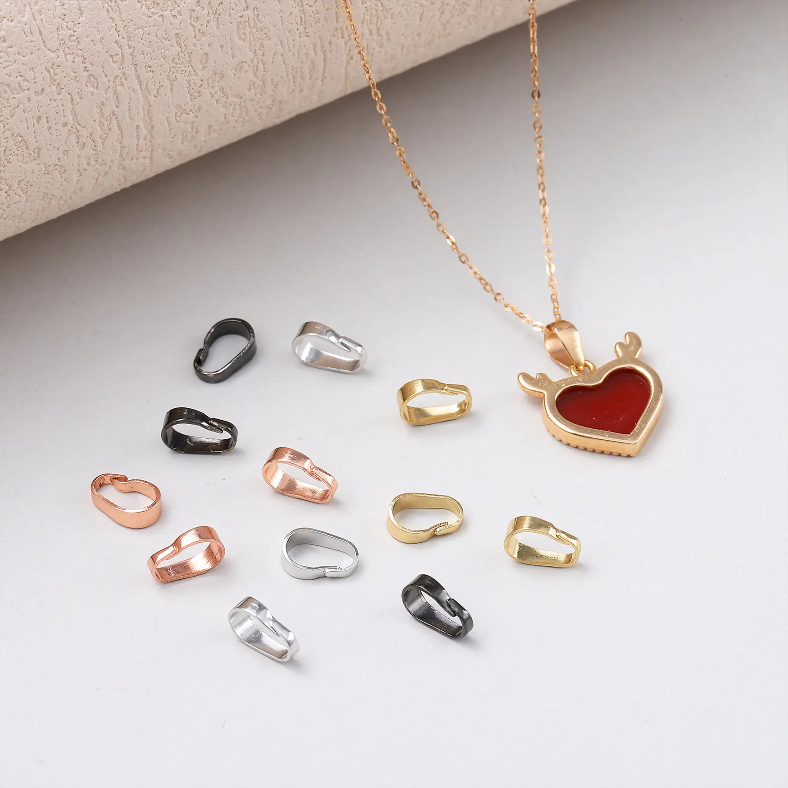 40Pcs Necklace Pendant Clasp and Pinch Bails for Jewelry Making Electroplated Copper DIY Connector for Craft Projects
40Pcs Necklace Pendant Clasp and Pinch Bails for Jewelry Making Electroplated Copper DIY Connector for Craft Projects