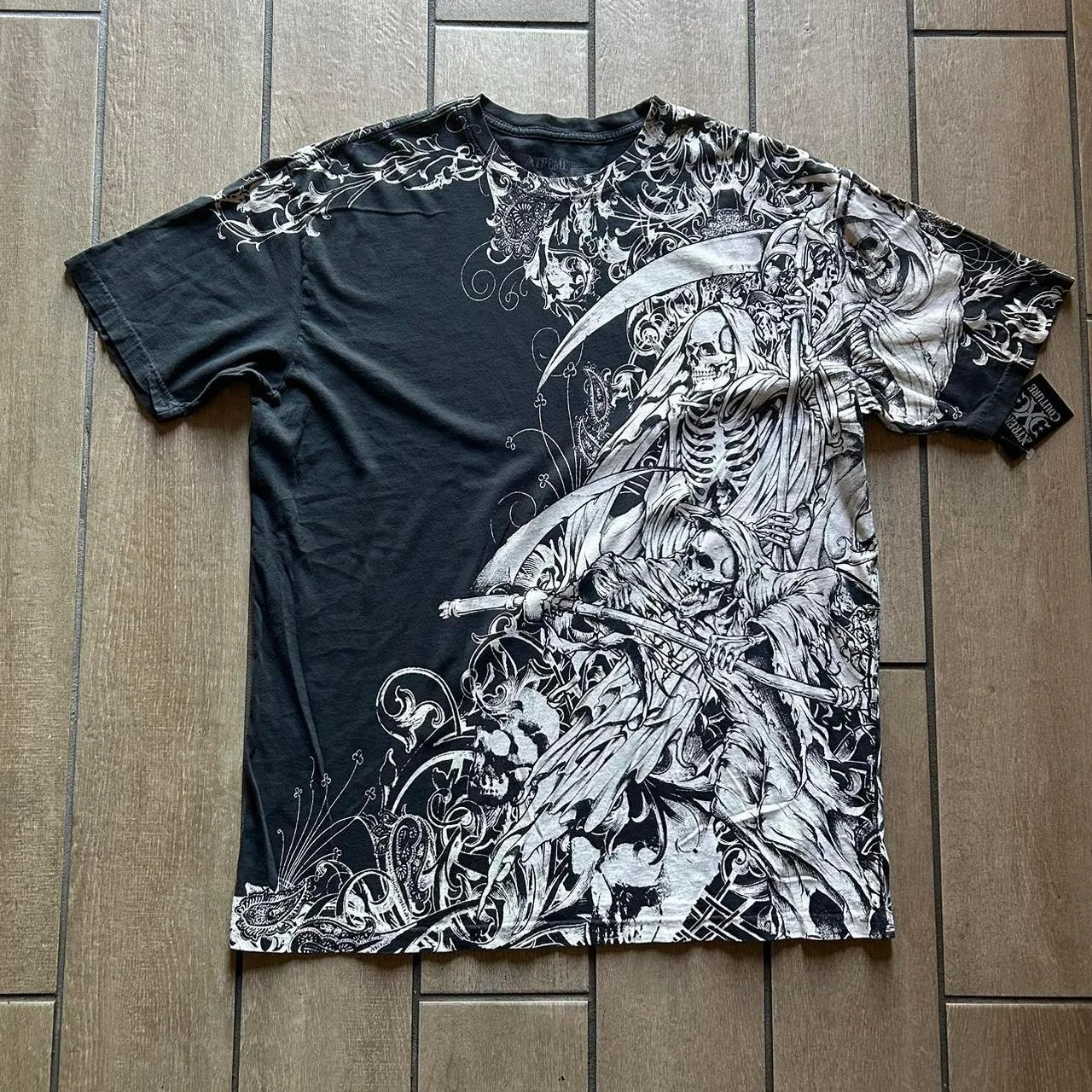 Винтажная футболка Xtreme Couture Affliction Nemesis Skulls, мужская байкерская черная готическая хлопковая футболка большого размера, потертые футболки унисекс
Винтажная футболка Xtreme Couture Affliction Nemesis Skulls, мужская байкерская черная готическая хлопковая футболка большого размера, потертые футболки унисекс