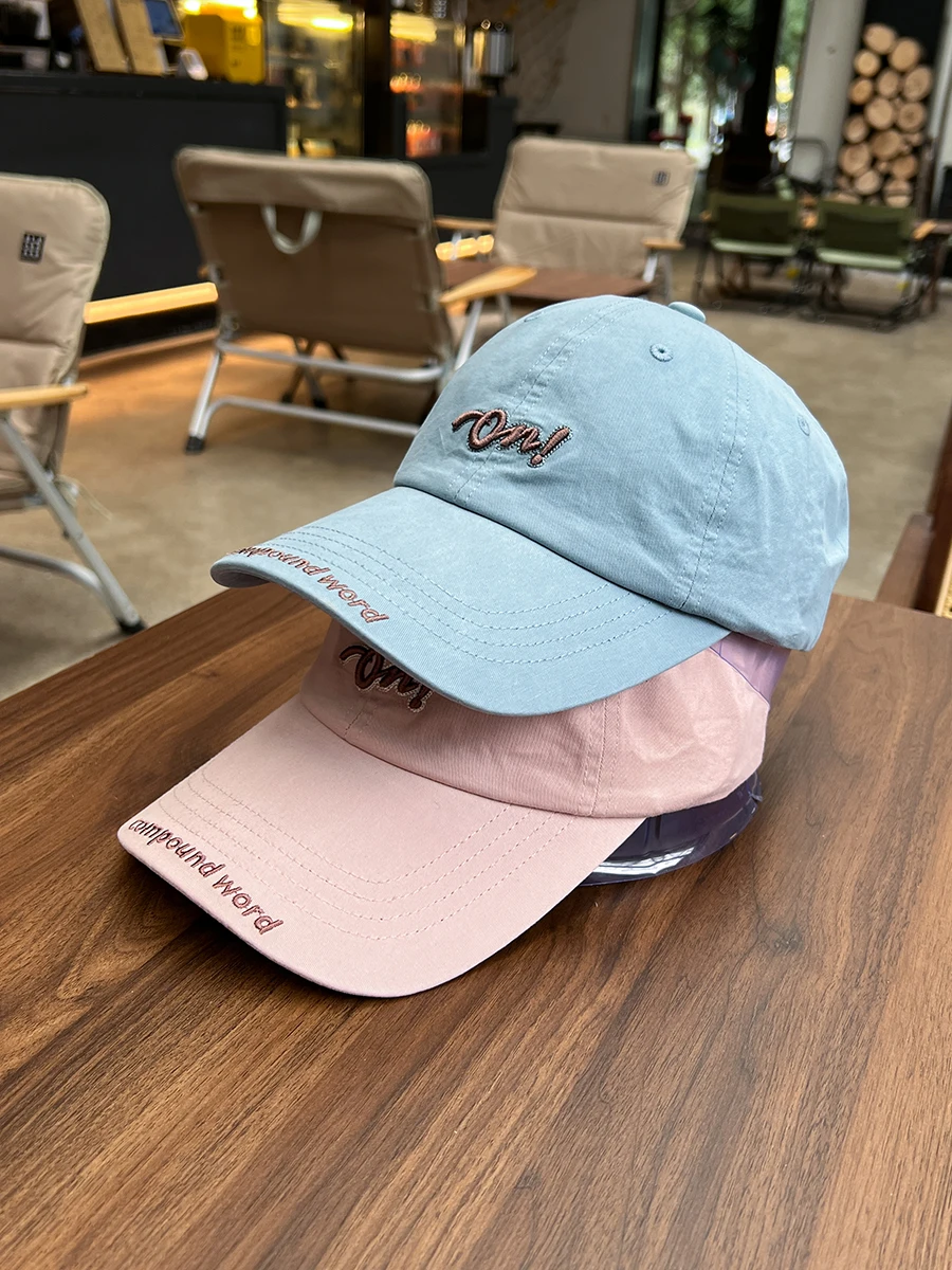 Simple letter embroidered baseball cap couple wide brim showing face small sunshade cap men
Simple letter embroidered baseball cap couple wide brim showing face small sunshade cap men