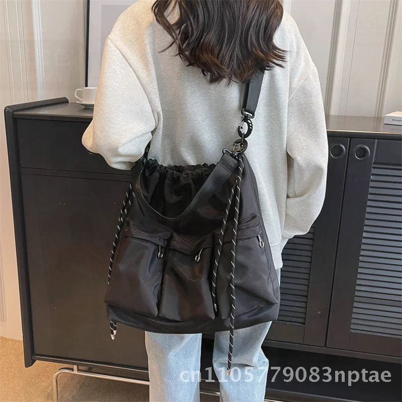 Women's Large Capacity Drawstring Tote Bag Trendy Cool Summer 2023 High-End Sports Casual Shoulder Bag Street Fashion Nylon
Women's Large Capacity Drawstring Tote Bag Trendy Cool Summer 2023 High-End Sports Casual Shoulder Bag Street Fashion Nylon