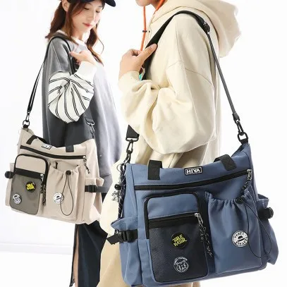 Compact nylon work-style casual single-shoulder bag with large capacity and multiple pockets for carrying tote bag
Compact nylon work-style casual single-shoulder bag with large capacity and multiple pockets for carrying tote bag