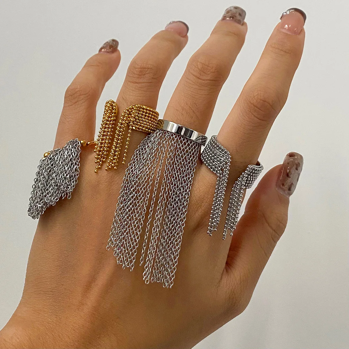 Adjustable Ring with Chain Tassels Embellishments Stainless Steel Gold and Silver Color Ring Ornament Party Accessory
Adjustable Ring with Chain Tassels Embellishments Stainless Steel Gold and Silver Color Ring Ornament Party Accessory