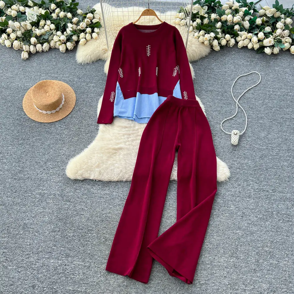 Новые модные лоскутные комплекты с жемчугом и бисером для женщин, трендовые топы с длинными рукавами, широкие брюки, зимние повседневные вязаные комплекты из двух предметов
Новые модные лоскутные комплекты с жемчугом и бисером для женщин, трендовые топы с длинными рукавами, широкие брюки, зимние повседневные вязаные комплекты из двух предметов 