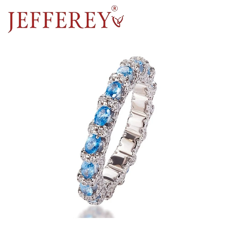 S925 Silver Oval Blue Colored Gemstone Row Ring Inlaid Round Moissanite Wedding Band White Gold Colour Women Luxury Jewelry Gift
S925 Silver Oval Blue Colored Gemstone Row Ring Inlaid Round Moissanite Wedding Band White Gold Colour Women Luxury Jewelry Gift