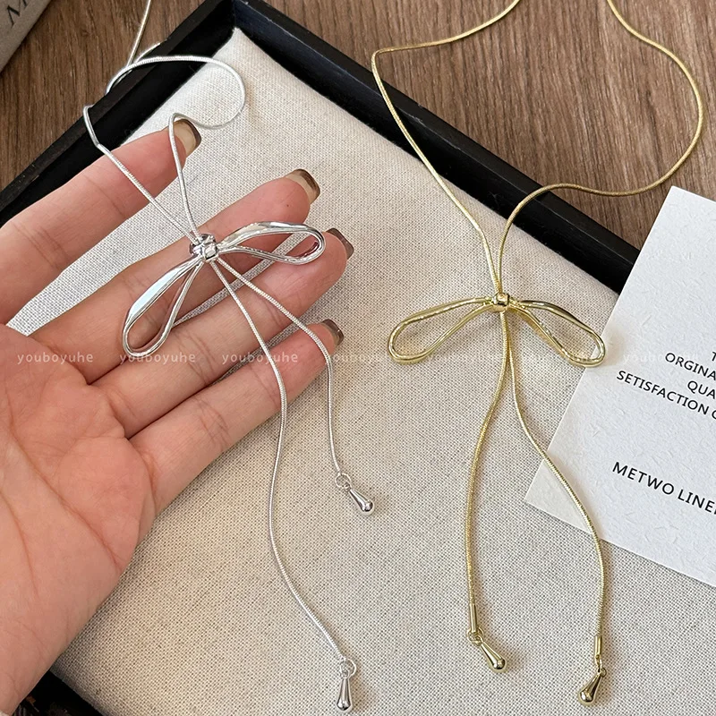 Sweet Cute Long Bowknot Tassel Necklace For Women Lady Exquisite Korean Adjustable Chain Sweater Necklace Party Banquet Jewelry
Sweet Cute Long Bowknot Tassel Necklace For Women Lady Exquisite Korean Adjustable Chain Sweater Necklace Party Banquet Jewelry